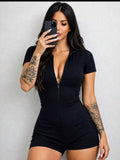 Macaquinho Fitness Canelado Feminino Manga Curta Preto com Shorts Modelador Confortável e Estiloso - Belle Lily